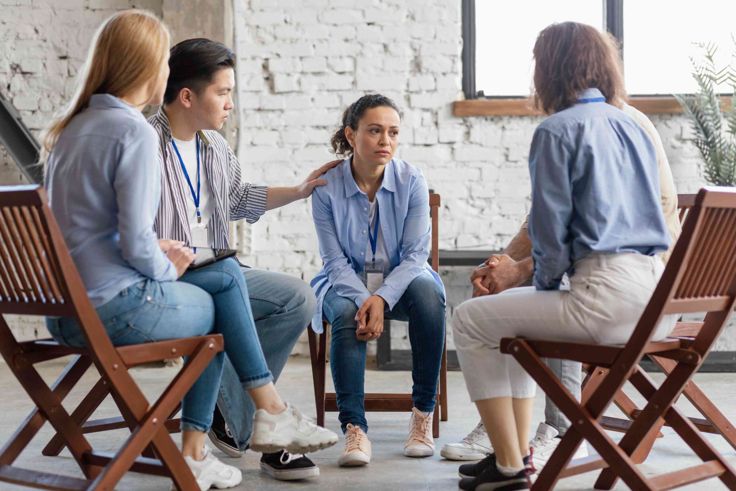 Young girl in a group therapy image
